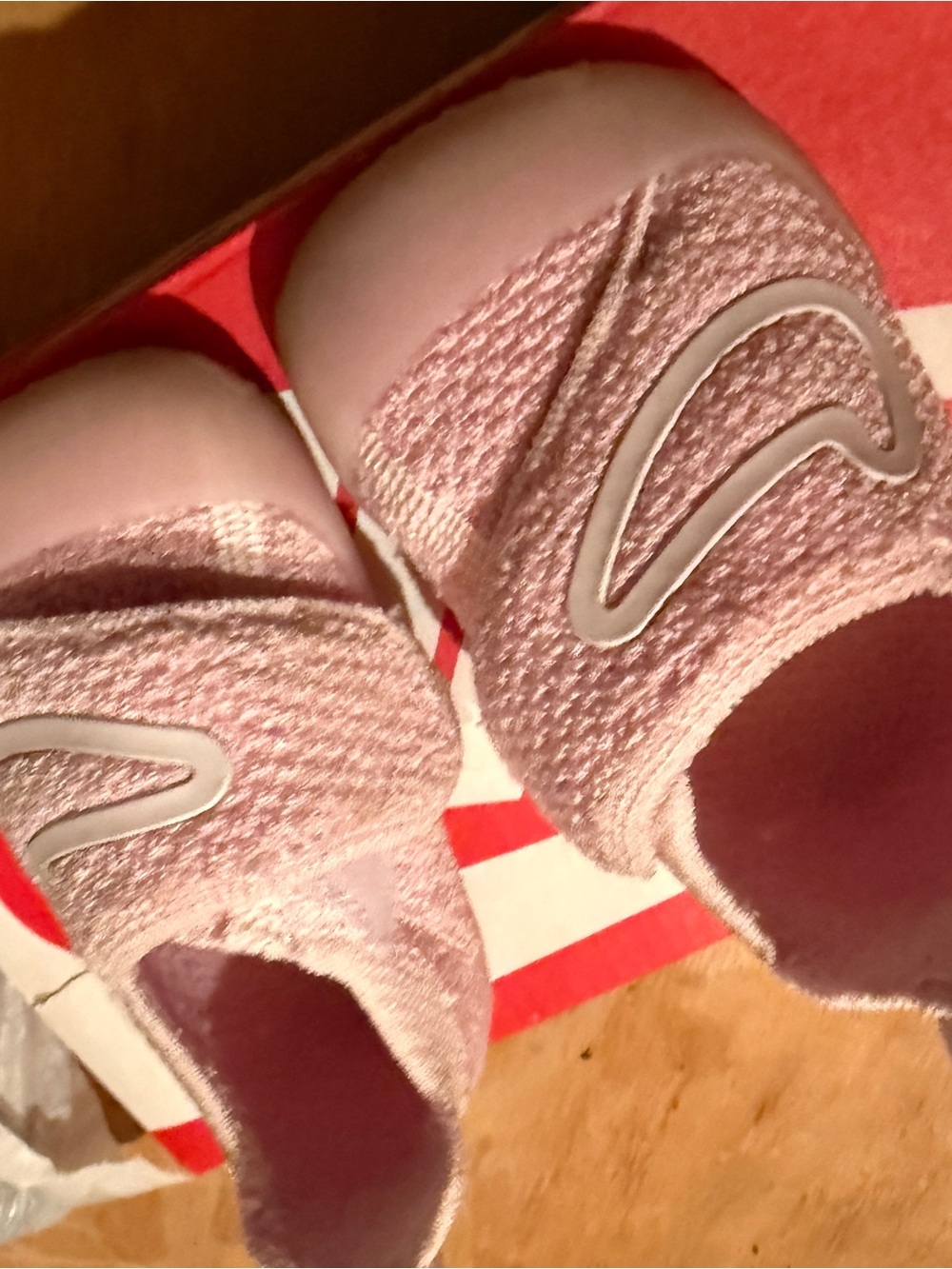 Nike Women’s Slip-On Knit Slides in Blush Pink